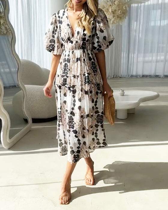 Printed dress with puff sleeves and V-neck