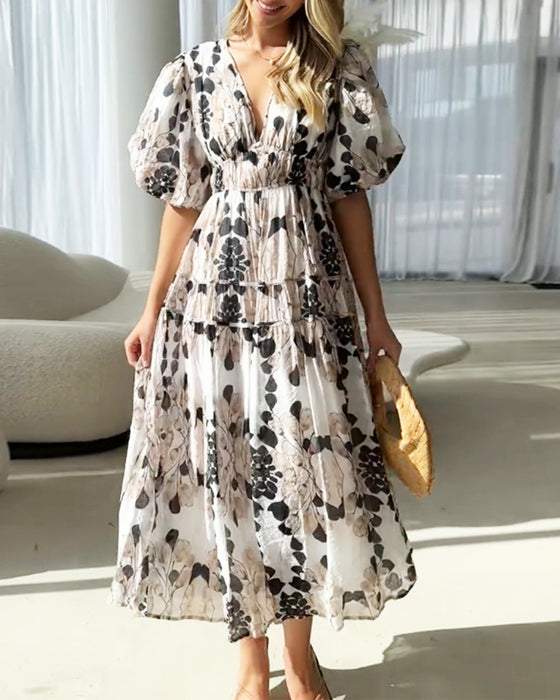 Printed dress with puff sleeves and V-neck